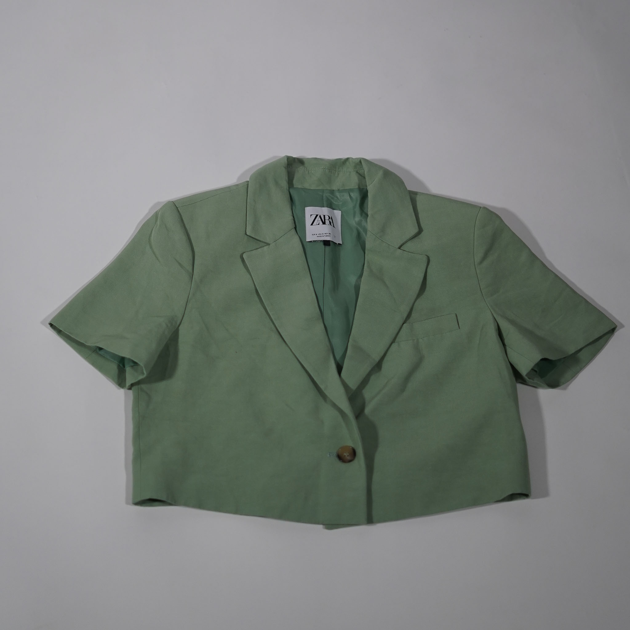 green blazer